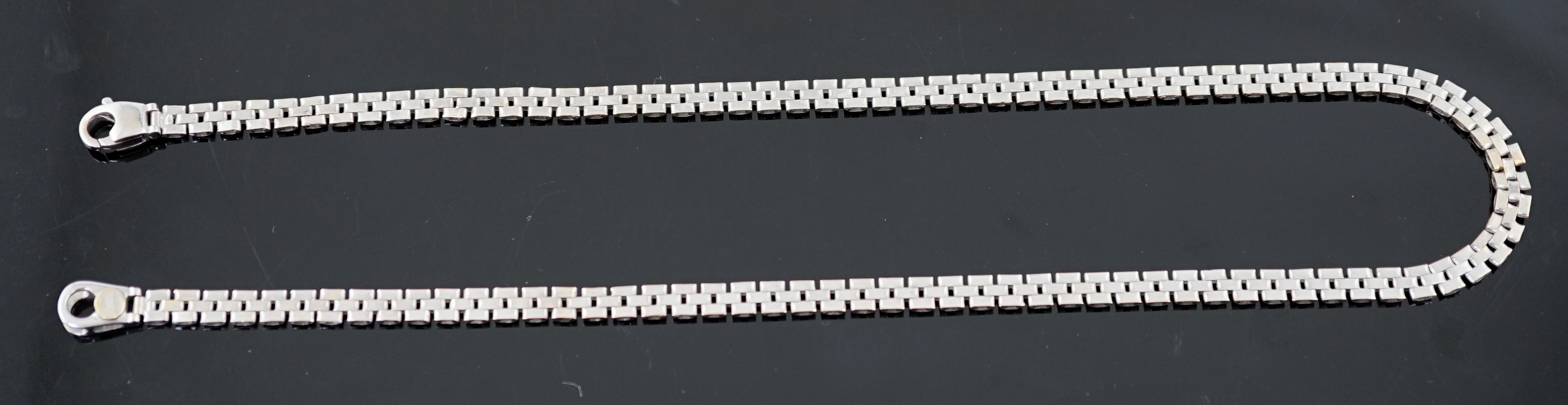 A modern Italian 18k white gold triple row link necklace